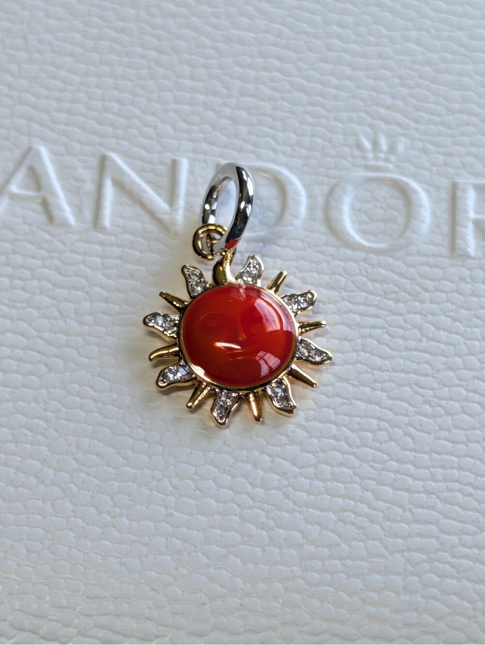 Pandora charm swirling sun